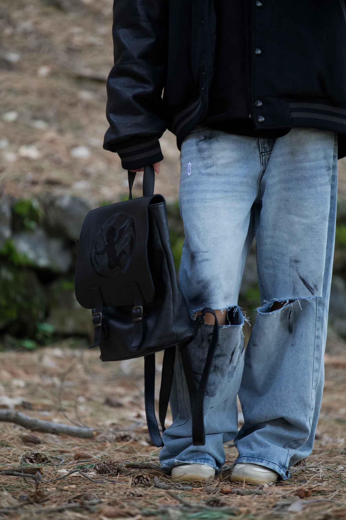 BORED LEATHER BACKPACK